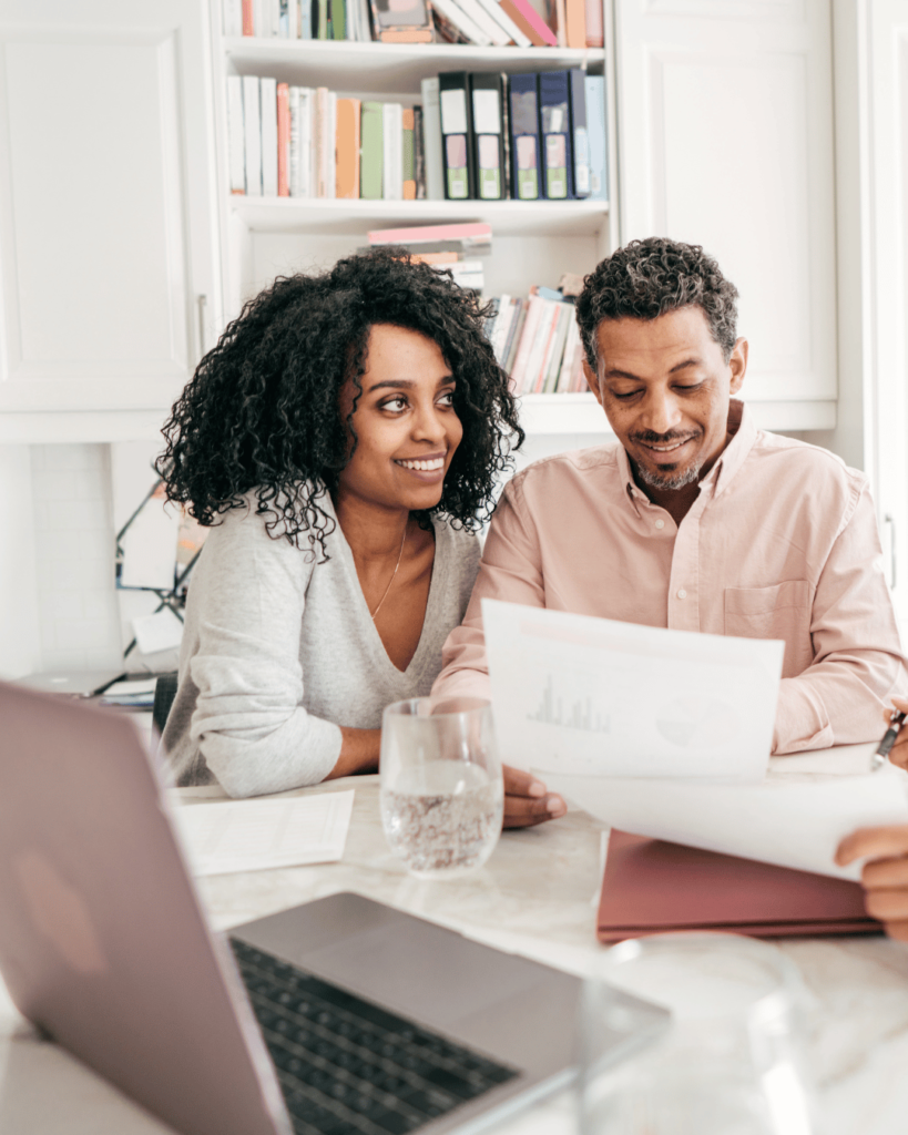 a couple learning about assumable FHA mortgages